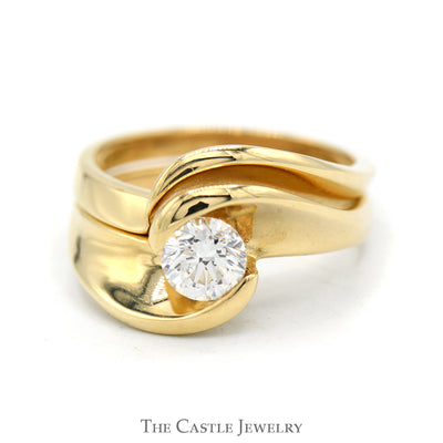 .65ct Diamond Solitaire Bridal Set with Swirled Mounting and Matching Band in 14k Yellow Gold