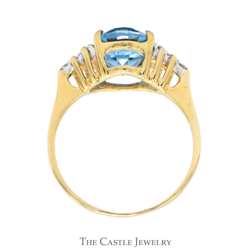 Oval Cut Blue Topaz Ring with Diamond Cluster Accented Sides in 14k Yellow Gold