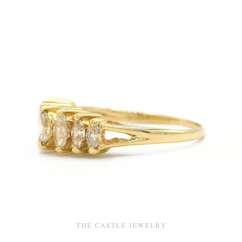 Side profile of the 14k yellow gold marquise diamond band showing setting height and band taper