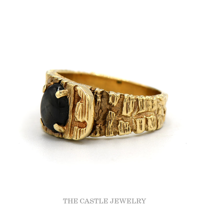 Side profile of the 10k yellow gold black star sapphire ring