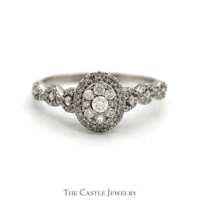 1/2cttw Oval Shaped Round Diamond Cluster Ring with Accented Twisted Sides in 10k White Gold Cathedral Mounting