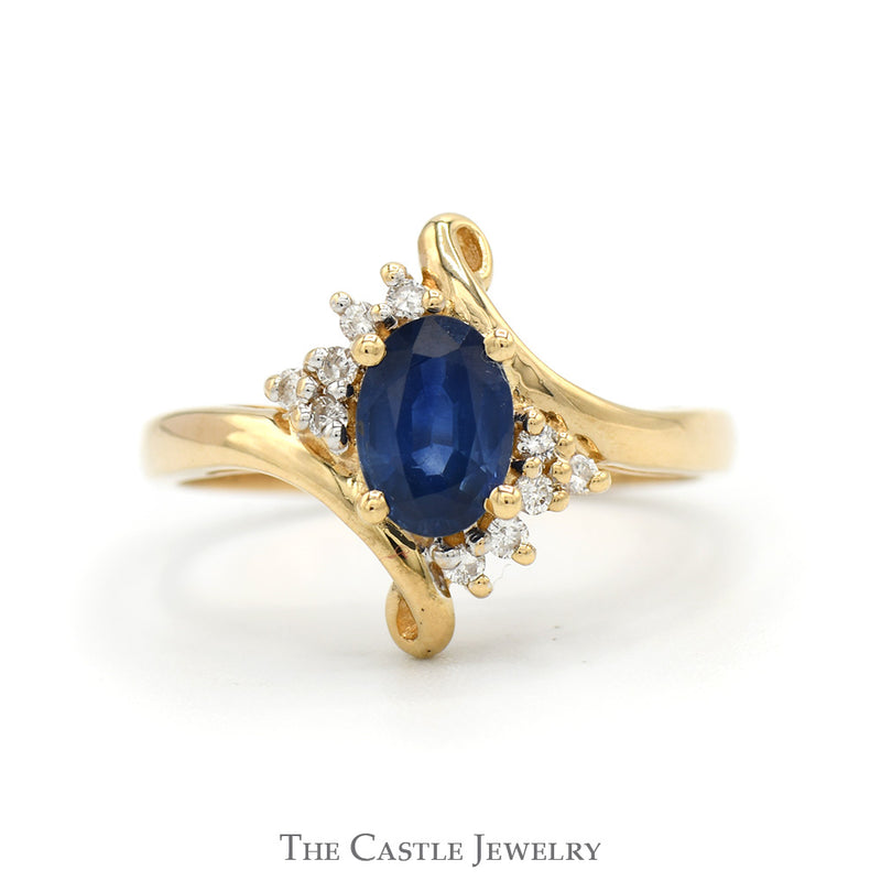 Oval Cut Sapphire Ring with Diamond Accents in 14k Yellow Gold Bypass Mounting