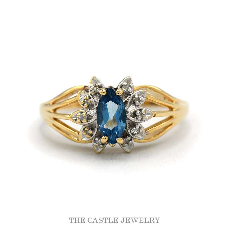 14k yellow gold marquise blue topaz ring with diamond accents — top view