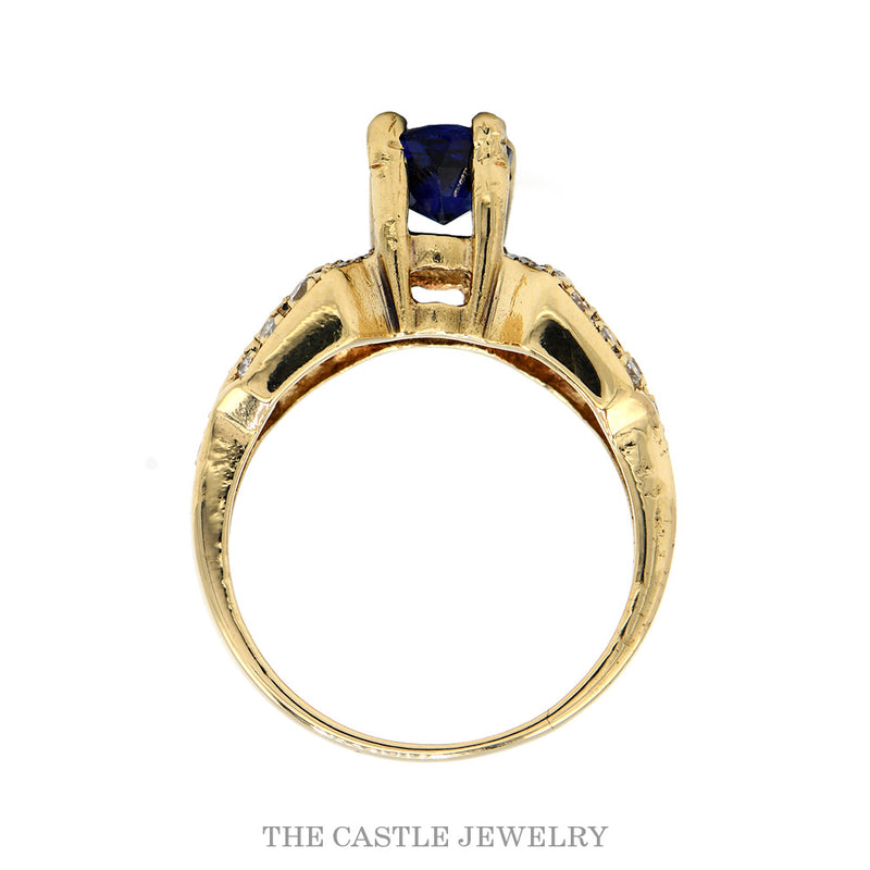 Round Sapphire Solitaire Ring with Diamond Cluster Accented Sides in 14k Yellow Gold
