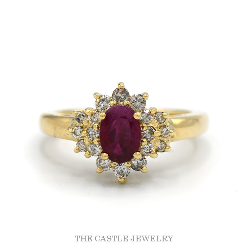 Oval ruby ring with .38cttw double diamond halo in 14k yellow gold — top view