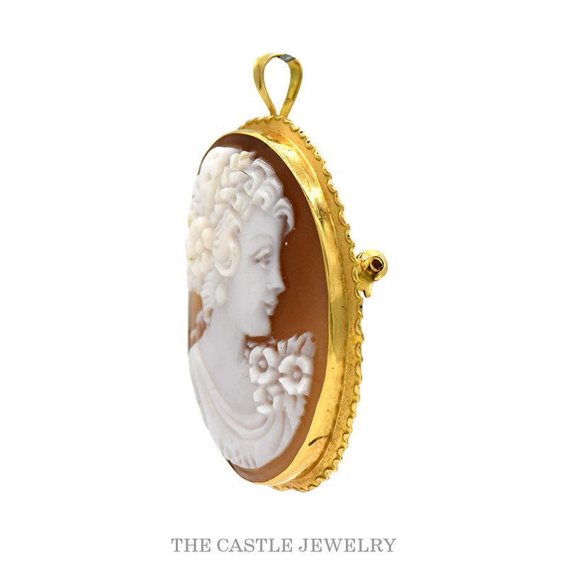 Side profile of the 18k yellow gold shell cameo showing bail and depth of carving
