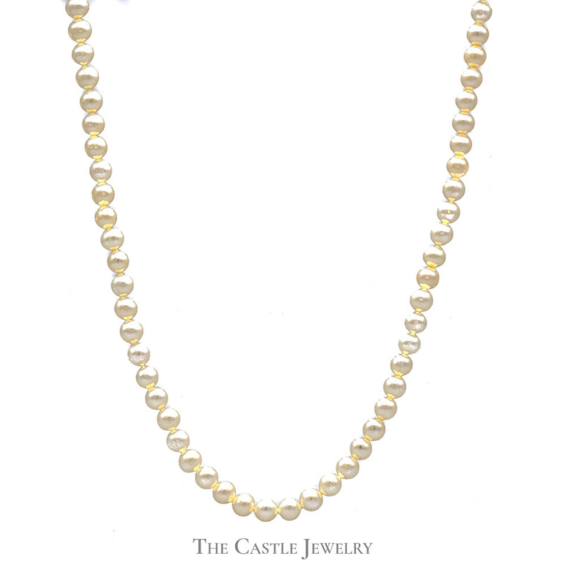 24 inch Strand of 6.5-7mm White Pearls with 14k Yellow Gold Clasp