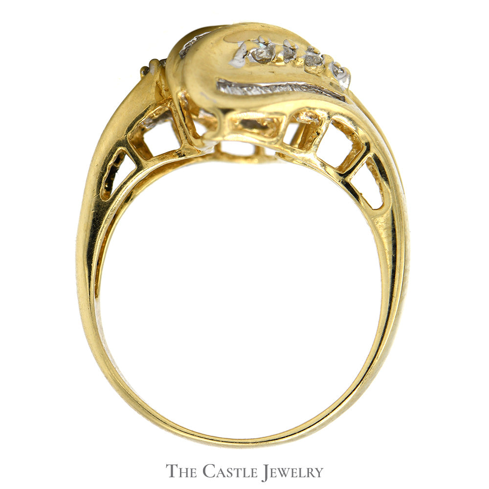 Channel Set Baguette and Round Diamond Swirled Ring in 14k Yellow Gold
