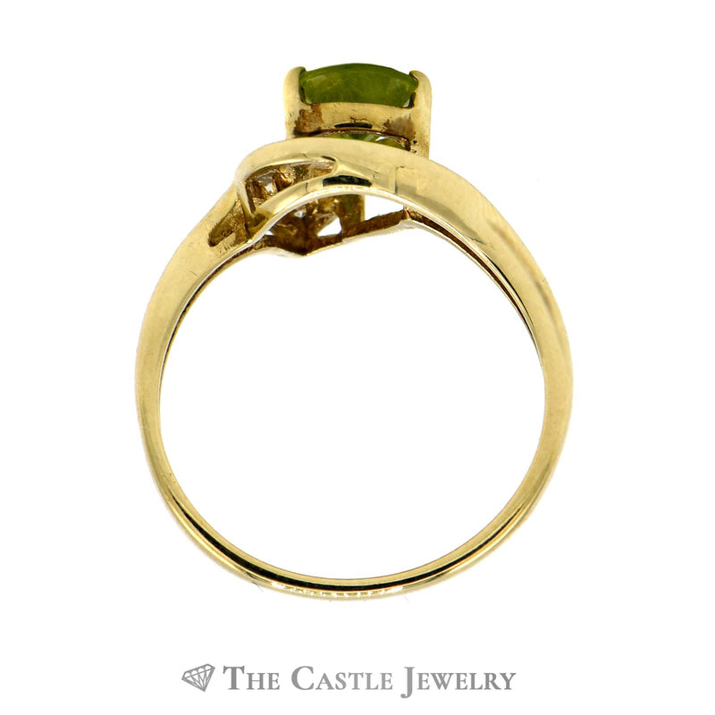 Pear Cut Peridot Ring with 3 Round Diamond Accents in 10k Yellow Gold