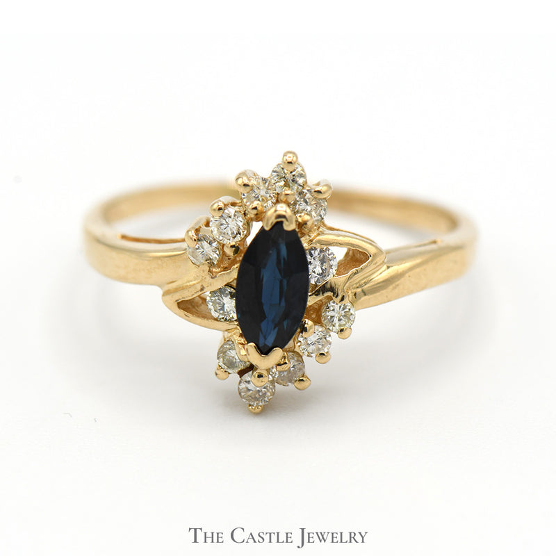 Marquise Cut Sapphire Ring with Diamond Accents in 14k Yellow Gold Bypass Mounting