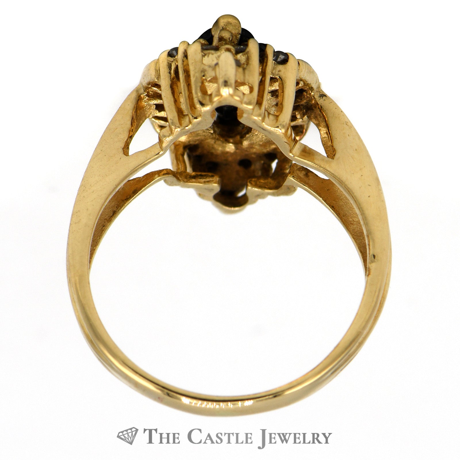 Marquise Shaped Sapphire Ring with Baguette and Round Diamond Accents