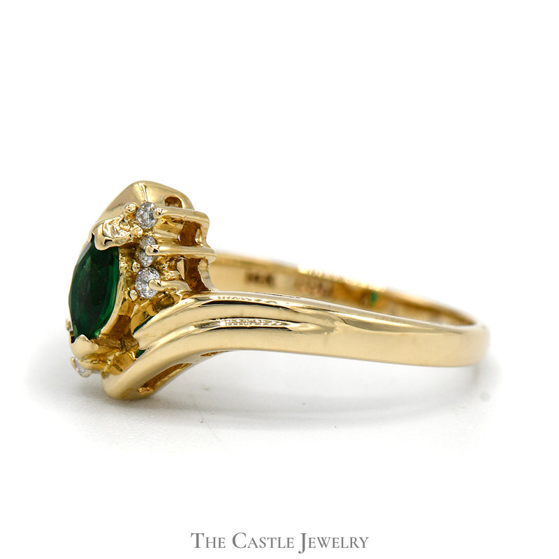 Marquise Cut Emerald Ring with Diamond Accents in 14k Yellow Gold