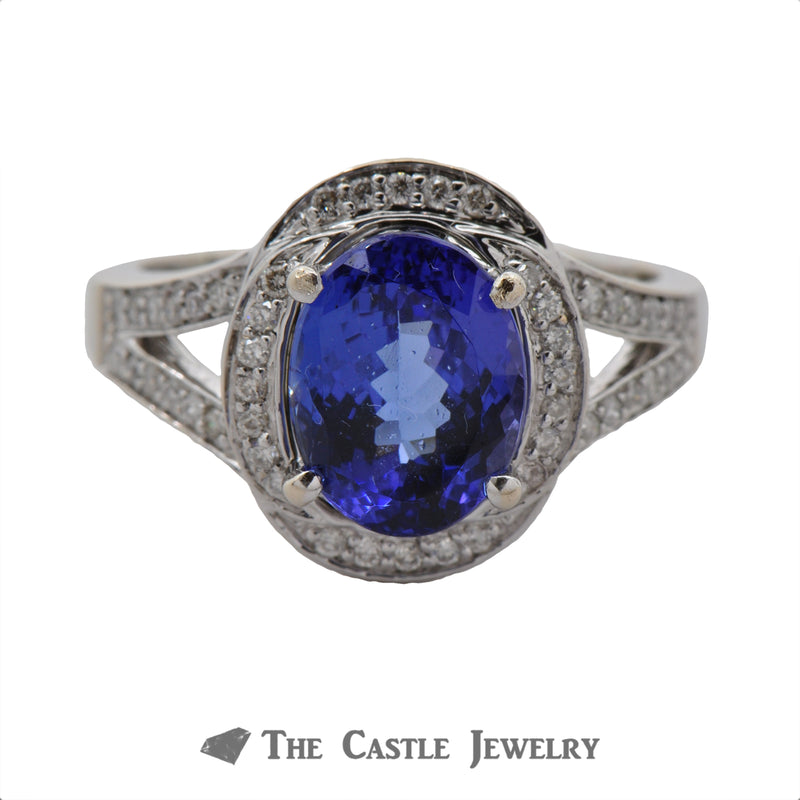 Oval Tanzanite Ring with Layered Diamond Bezel