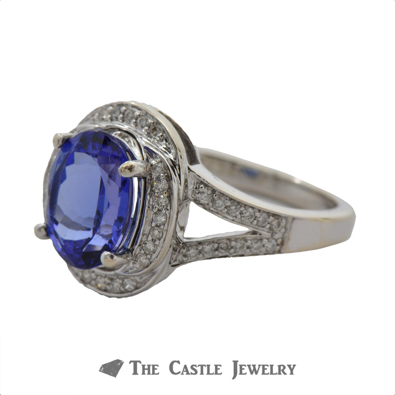 Oval Tanzanite Ring with Layered Diamond Bezel