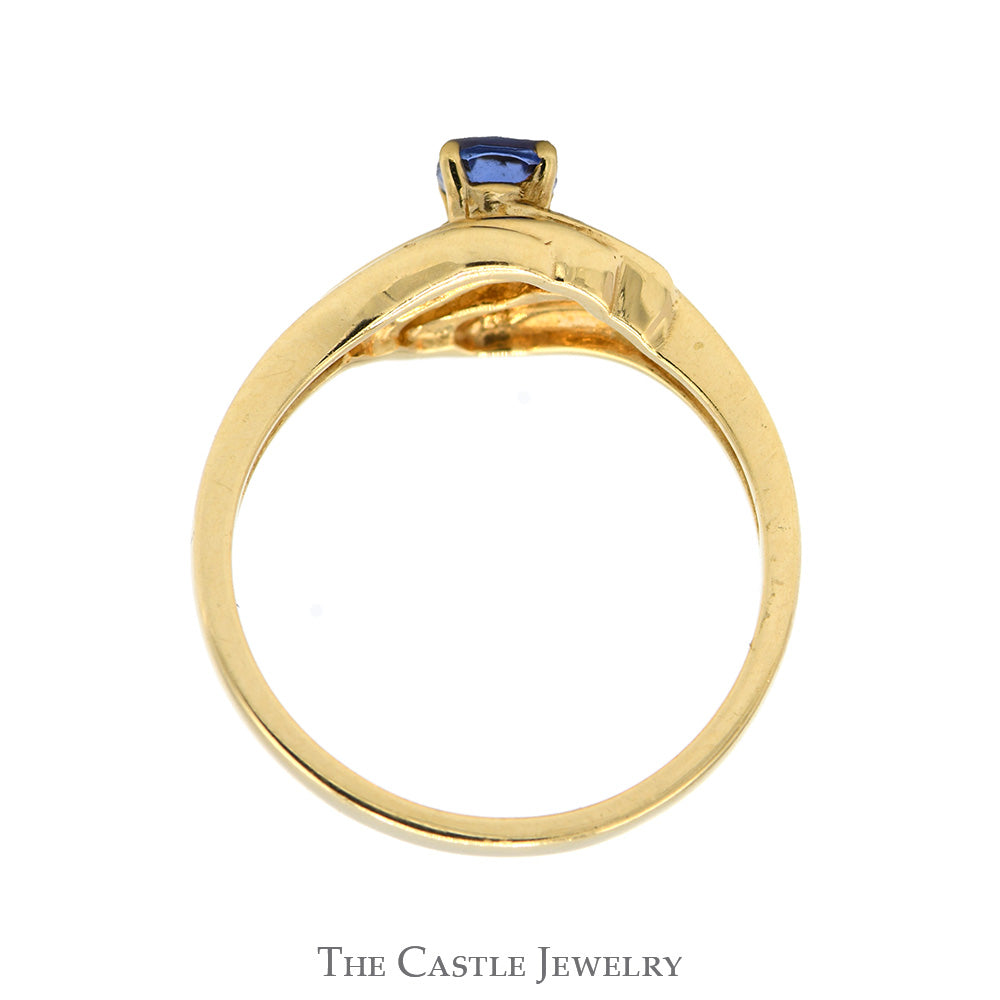 Oval Tanzanite Ring with Diamond Accented Sides in 14k Yellow Gold