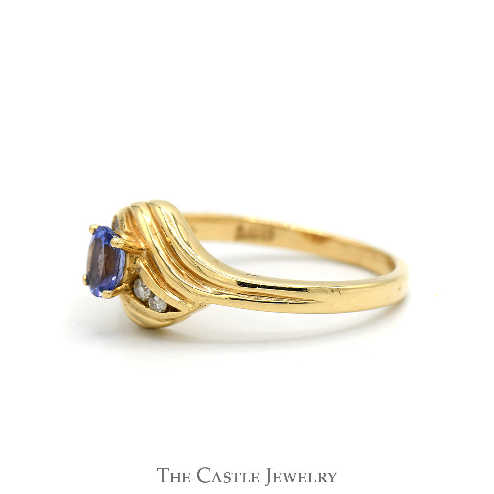 Oval Tanzanite Ring with Diamond Accented Sides in 14k Yellow Gold