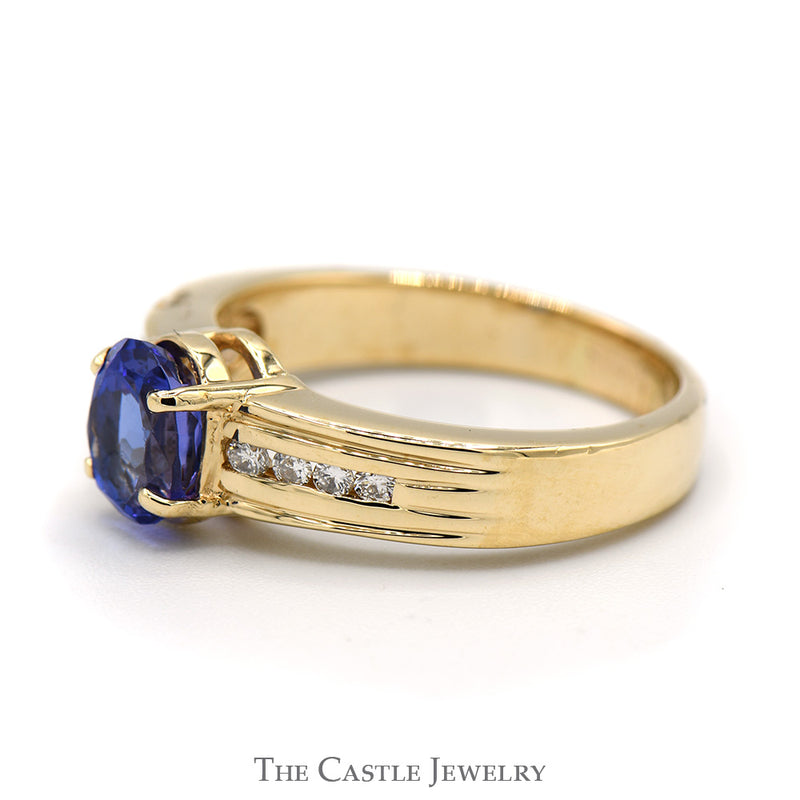 Oval Tanzanite Ring with Channel Set Round Diamond Accents in 14K Yellow Gold