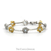 7 1/4 Inch Two Tone Flower Bar Link Bracelet with Blue Topaz Accents in 14k White & Yellow Gold - Thumbnail 1