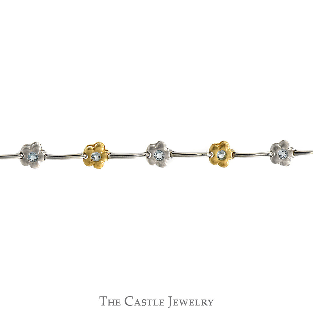 7 1/4 Inch Two Tone Flower Bar Link Bracelet with Blue Topaz Accents in 14k White & Yellow Gold