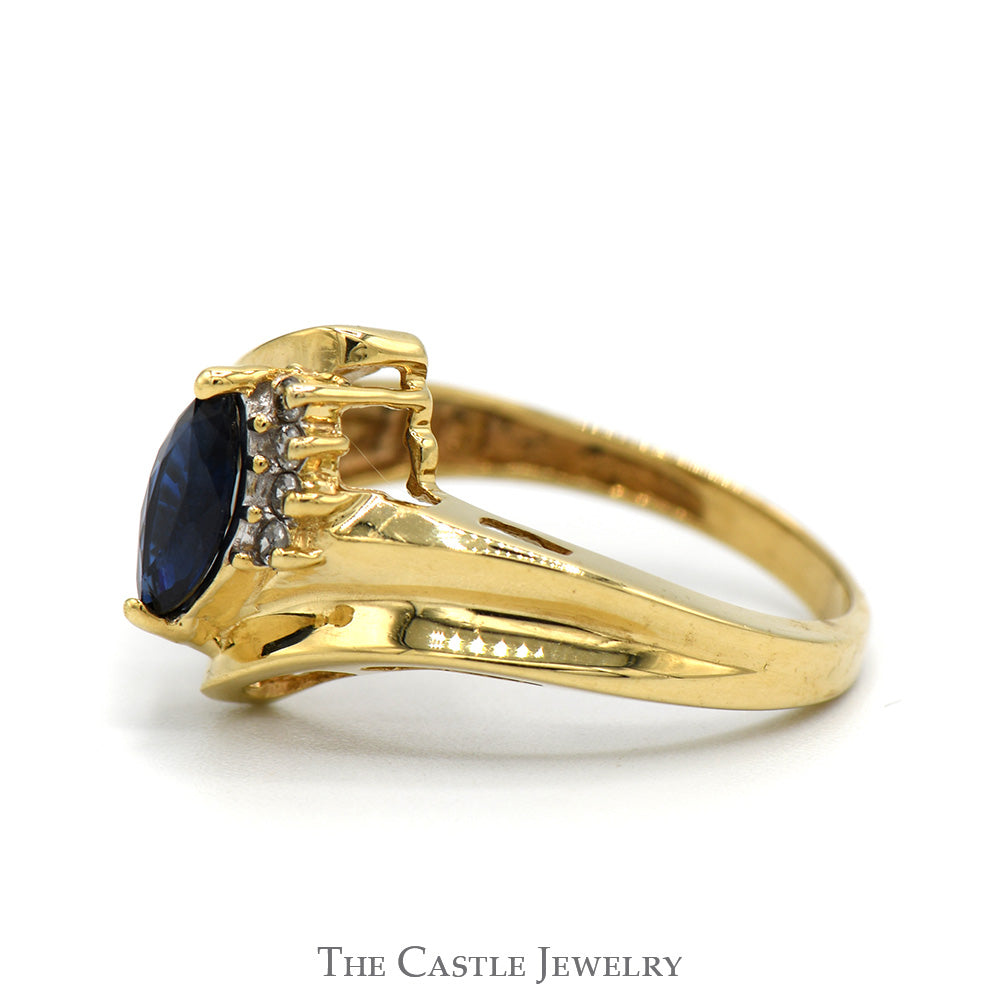 Marquise Cut Sapphire Ring with Diamond Accents in 10k Yellow Gold