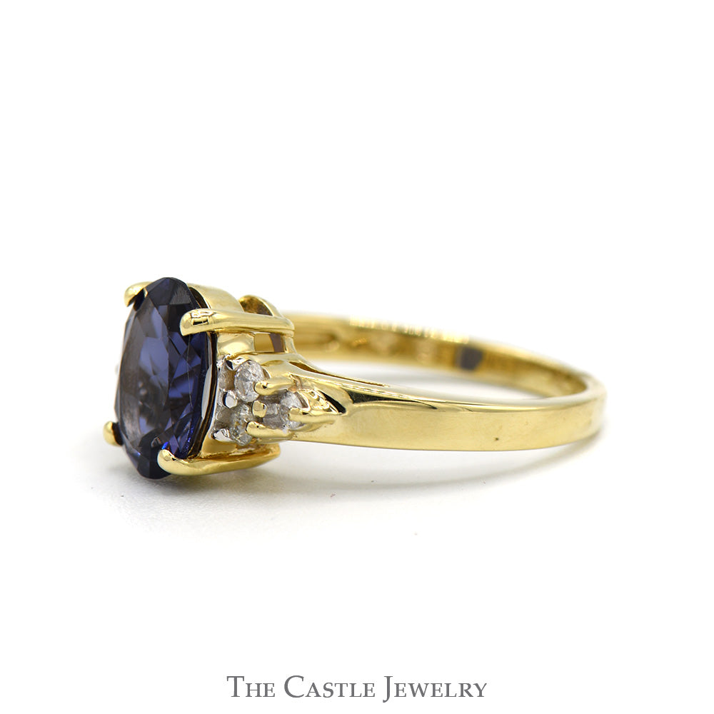 Oval Tanzanite Ring with Diamond Cluster Sides in 14k Yellow Gold