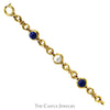 7 1/2 inch Round Cabochon Lapis and Mabe Pearl Link Bracelet with Round Ruby Accents in 18k Yellow Gold - Thumbnail 1