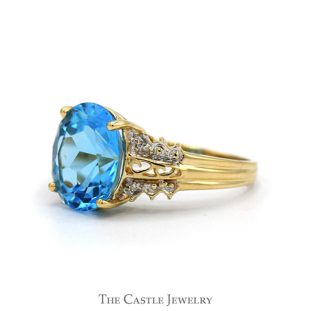 Oval Topaz Ring with Diamond Accented Scroll Designed Sides in 10k Yellow Gold