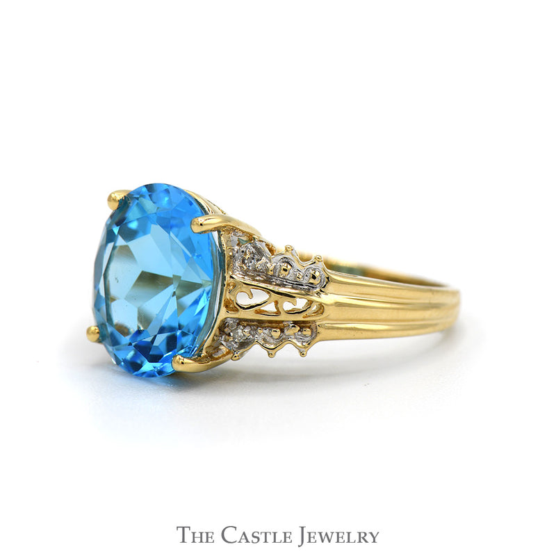 Oval Topaz Ring with Diamond Accented Scroll Designed Sides in 10k Yellow Gold
