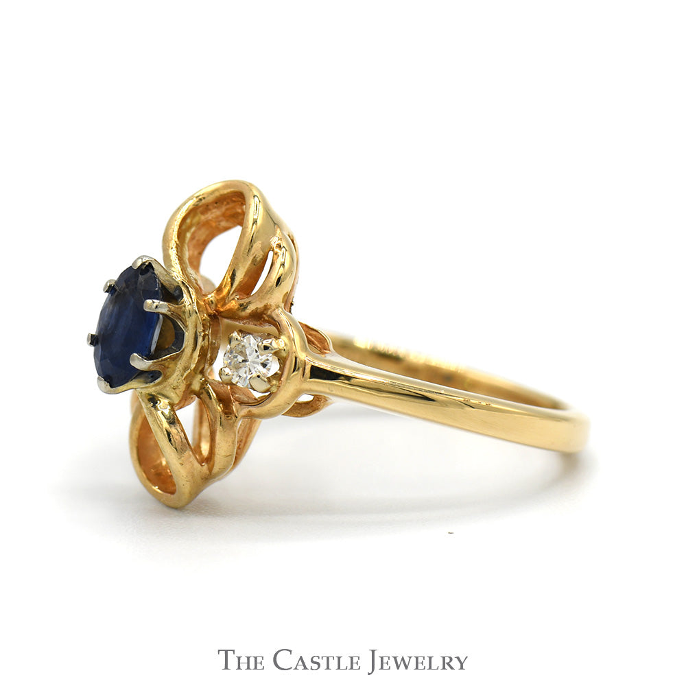 Oval Sapphire Ring with Diamond Accents in Interweaving Looped Design in 14k Yellow Gold