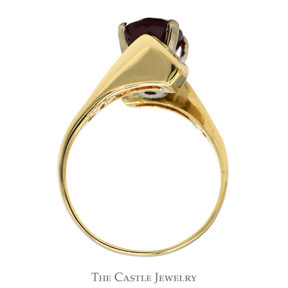 Oval Ruby Ring with Channel Set Diamond Accented Bypass Setting in 14k Yellow Gold