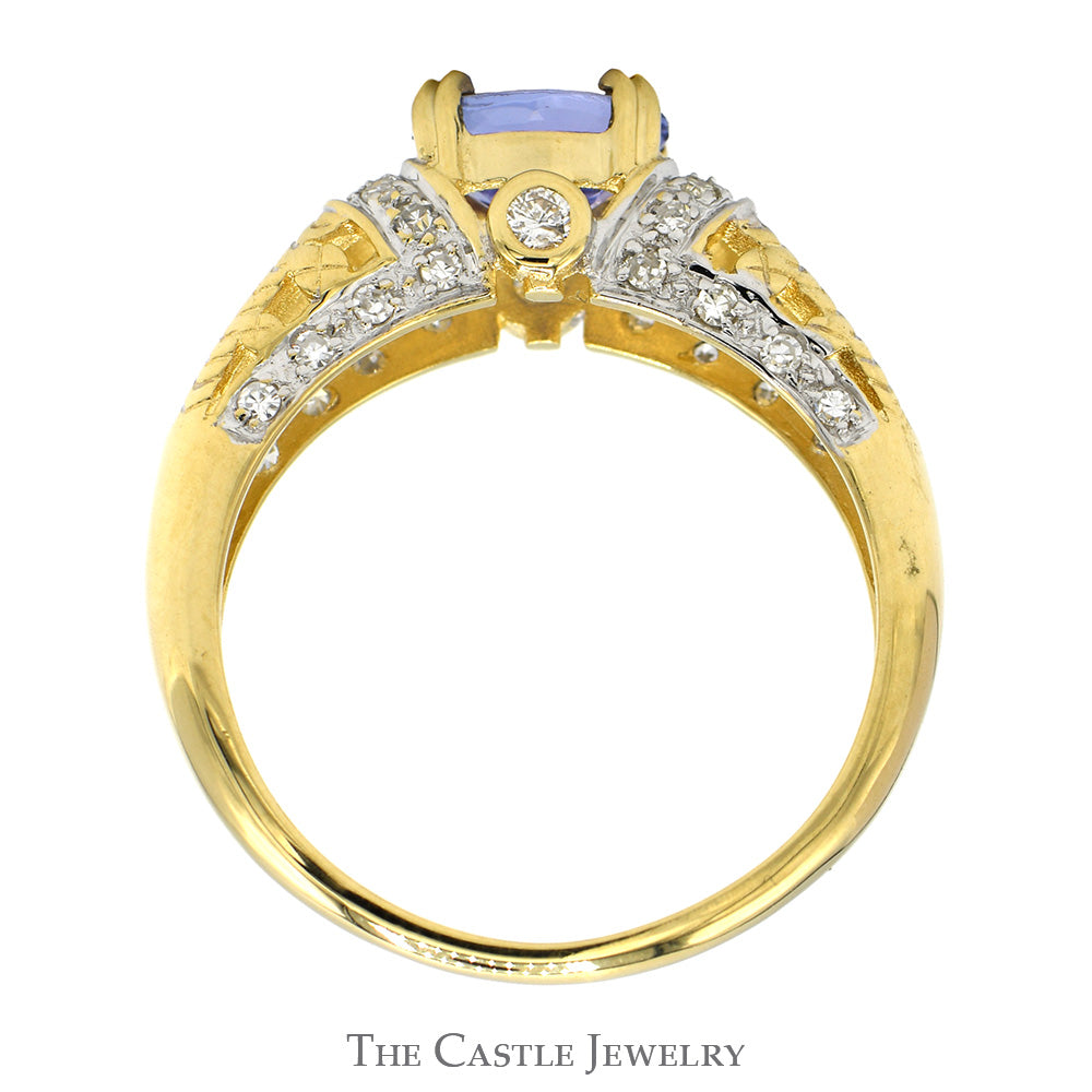 Oval Tanzanite Ring with Diamond Accented Sides in Ornate 14k Yellow Gold Mounting