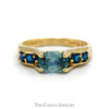 Oval Blue Zircon Ring with Blue Topaz Sides in 14k Yellow Gold Bridge Designed Mounting - Thumbnail 1