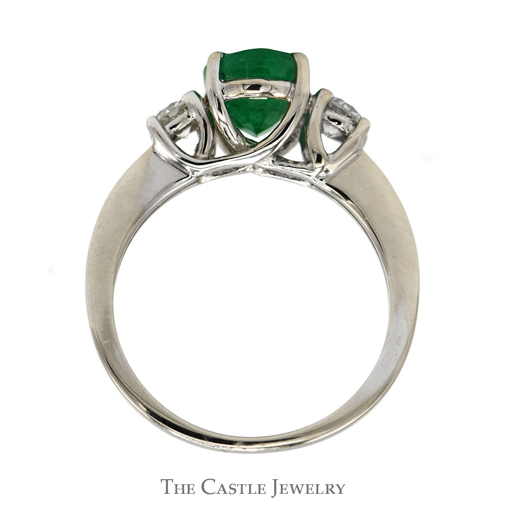 Oval Cut Emerald Ring with Diamond Accented Sides in 18k White Gold