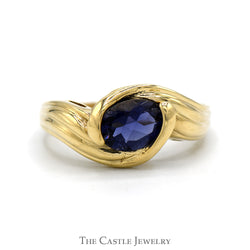 Side Set Oval Tanzanite Ring in 10k Yellow Gold Bypass Setting