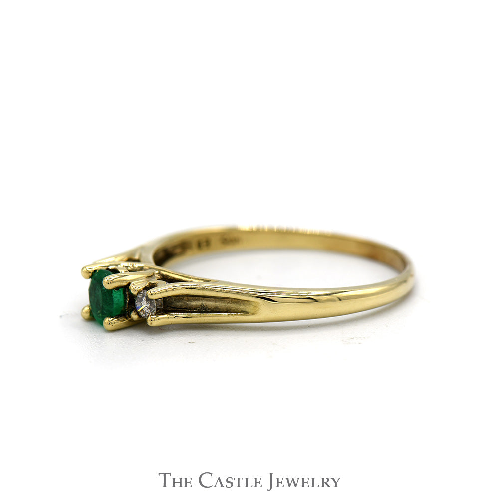 Three Stone Oval Emerald & Round Diamond Ring in 10k Yellow Gold