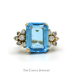 Emerald Cut Blue Topaz Ring with 1/2cttw Diamond Cluster Sides in 14k Yellow Gold