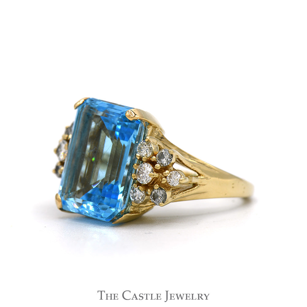 Emerald Cut Blue Topaz Ring with 1/2cttw Diamond Cluster Sides in 14k Yellow Gold