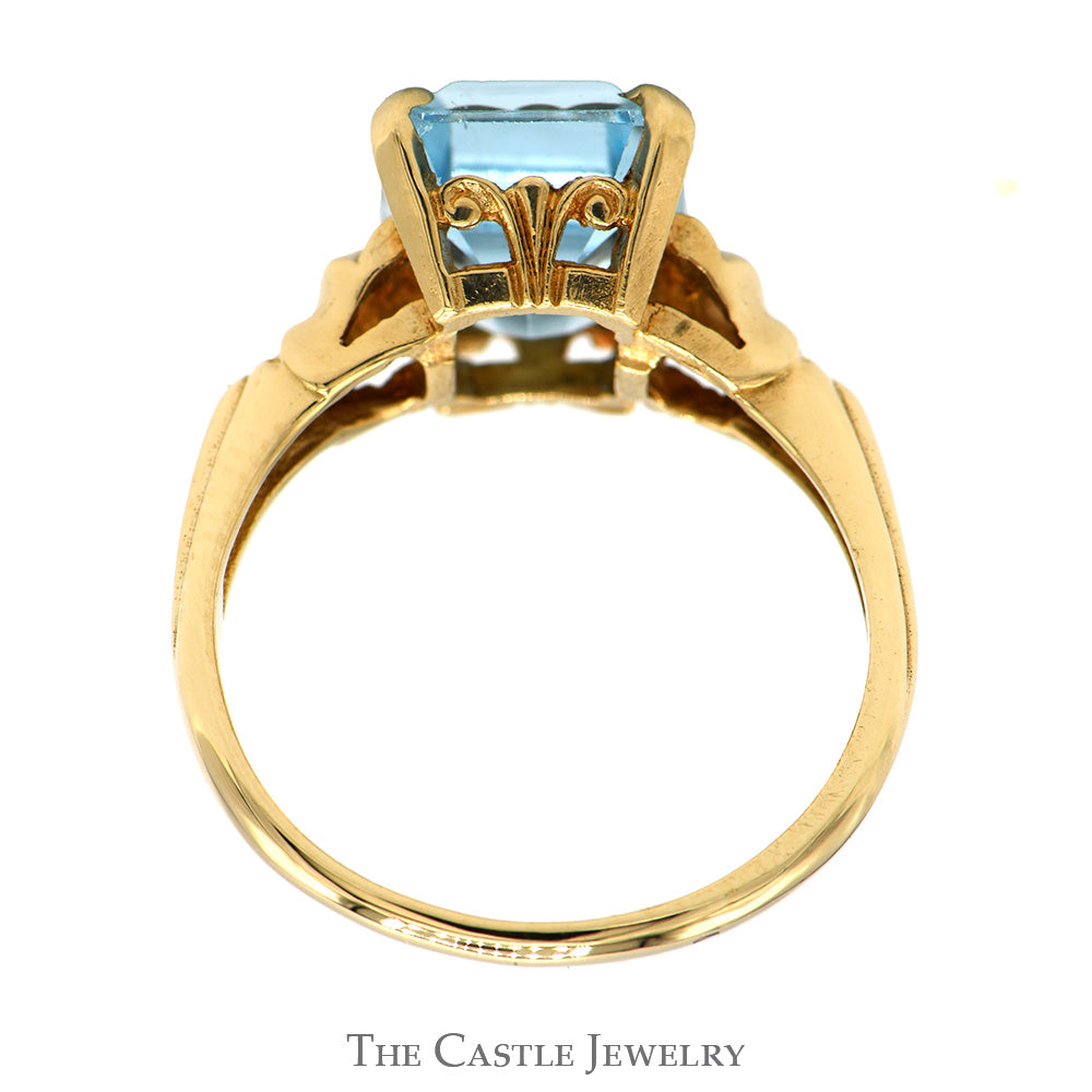 Emerald Cut Blue Topaz Ring with Textured Sides in 10k Yellow Gold