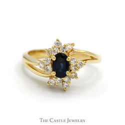 Oval Sapphire Ring with Starburst Designed Diamond Halo in 14k Yellow Gold