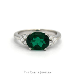 Side Set Oval Cut Lab Created Emerald Ring with Diamond Accents in 14k White Gold