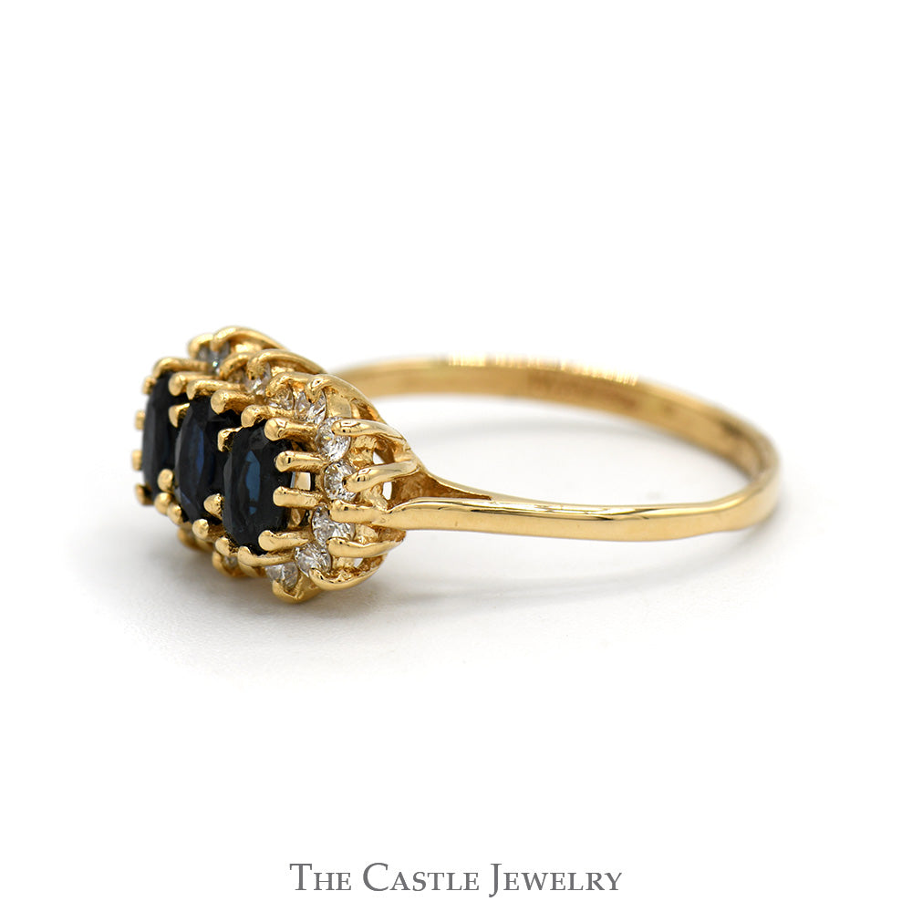 Three Stone Oval Sapphire Ring with Diamond Halos in 14k Yellow Gold