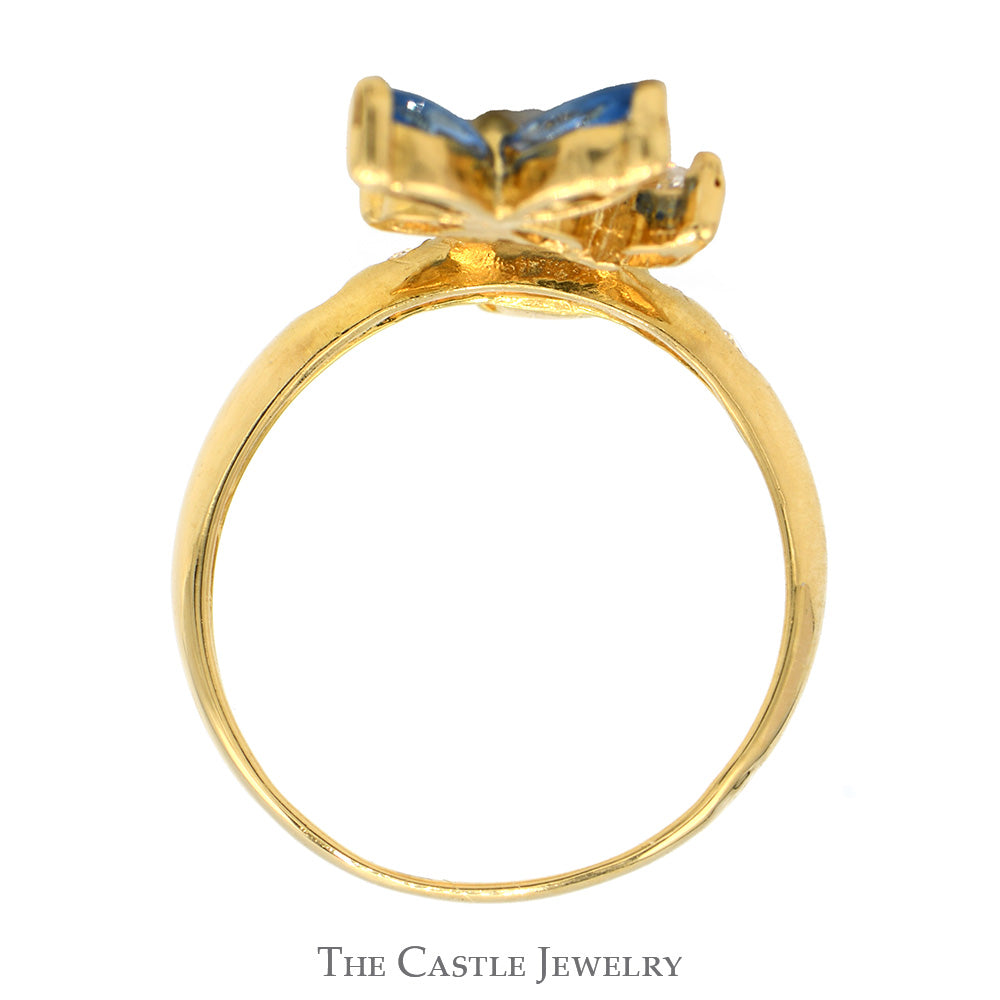 Marquise Cut Blue Topaz Flower Ring with Cubic Zirconia Accents in 18k Yellow Gold