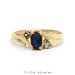 Oval Sapphire Ring with Illusion Set Diamond Accents in 14k Yellow Gold