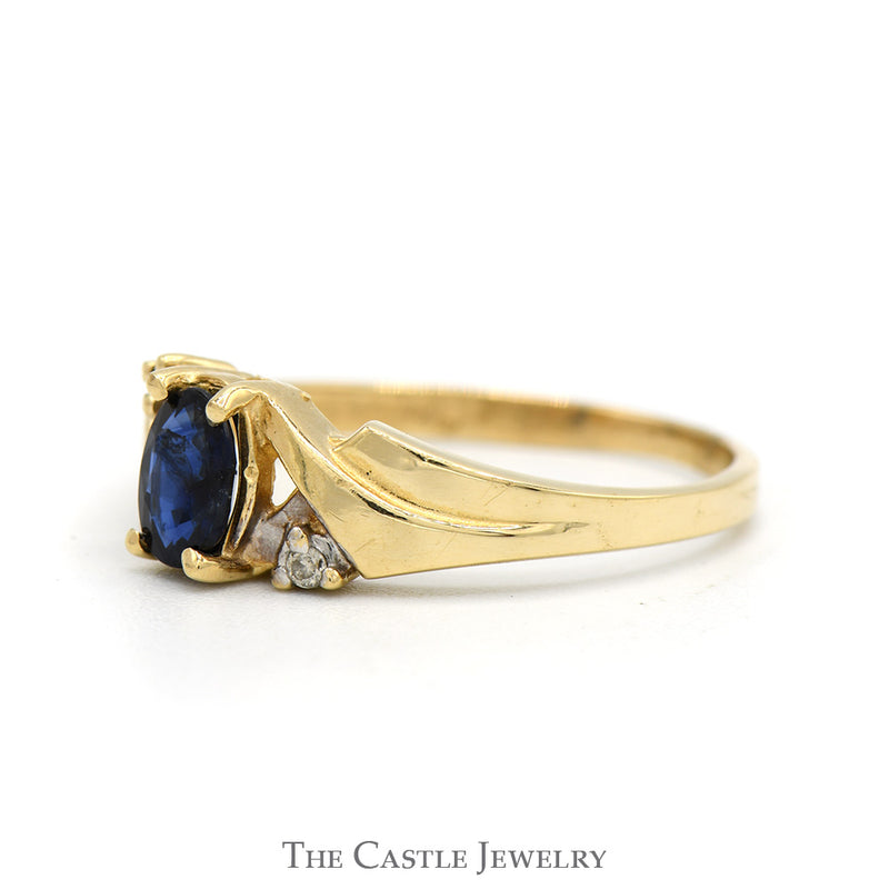 Oval Sapphire Ring with Illusion Set Diamond Accents in 14k Yellow Gold