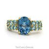 Oval Cut Blue Topaz Ring with Blue Topaz Cluster Sides in 14k Yellow Gold - Thumbnail 1