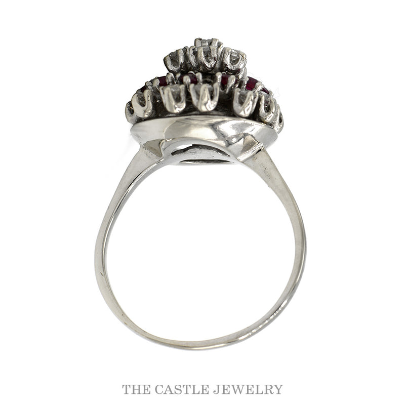 Front-facing view of the ruby and diamond starburst cluster ring in 14k white gold