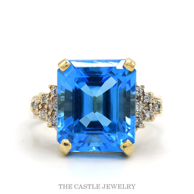 Emerald Cut Blue Topaz Ring with Diamond Cluster Sides in 14k Yellow Gold