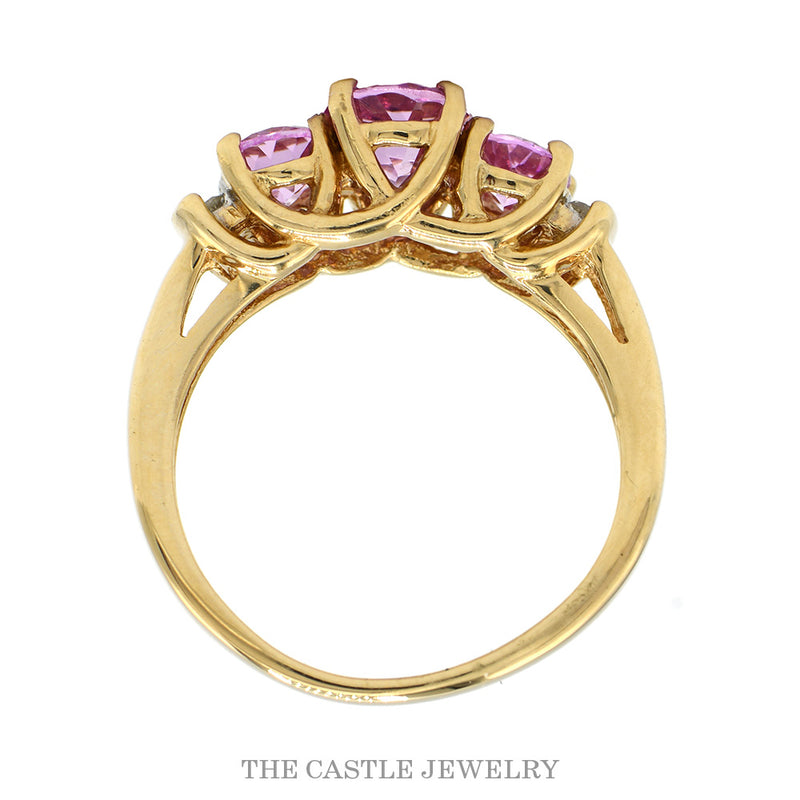Three Stone Oval Cut Pink Topaz Ring with Diamond Accented Sides in 10k Yellow Gold
