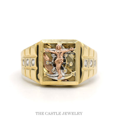 14k tri-color gold men's crucifix ring with rose-gold Christ figure, textured yellow-gold cross, and channel-set cubic zirconia accents on Rolex-style shoulders — top view