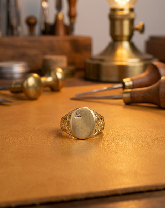 Men's Oval Signet Ring with Diamond Accent and Nugget Sides in 10k Yellow Gold